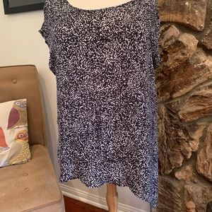 Torrid asymmetrical black & white blouse.